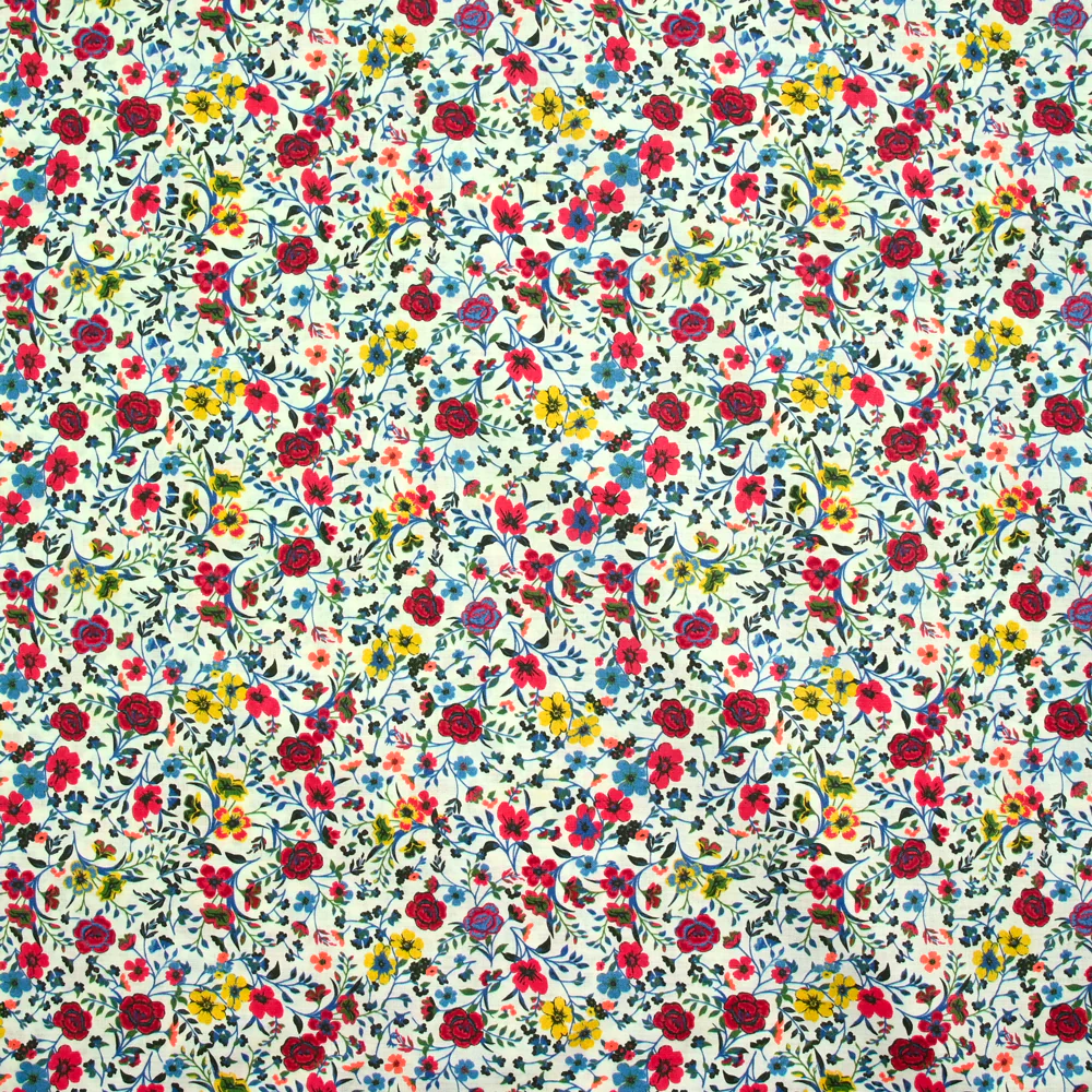 Coton imprimé Aurora fleurs rouge et jaune fond blanc au mètre