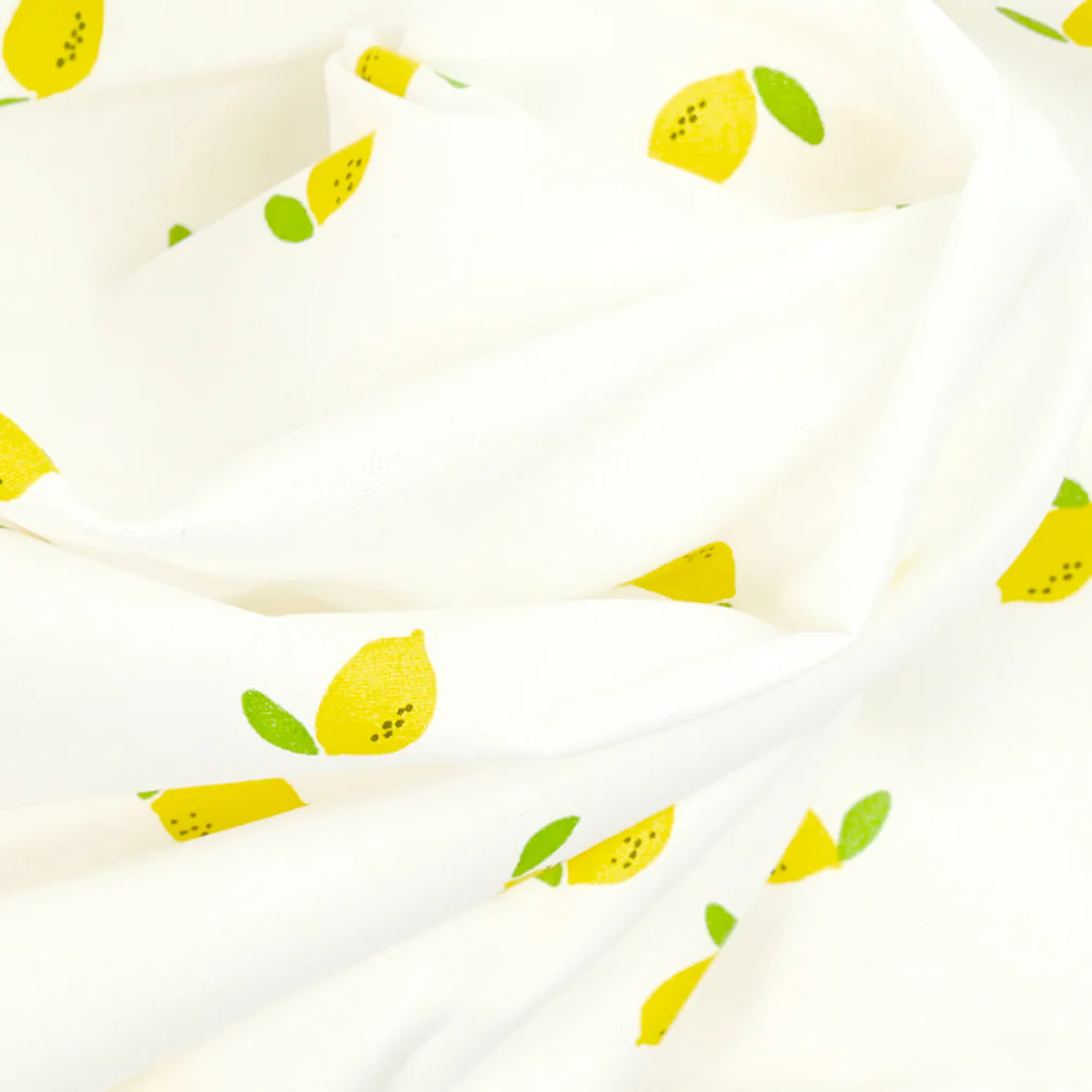 Coton imprimé citron jaune fond blanc - Image 2