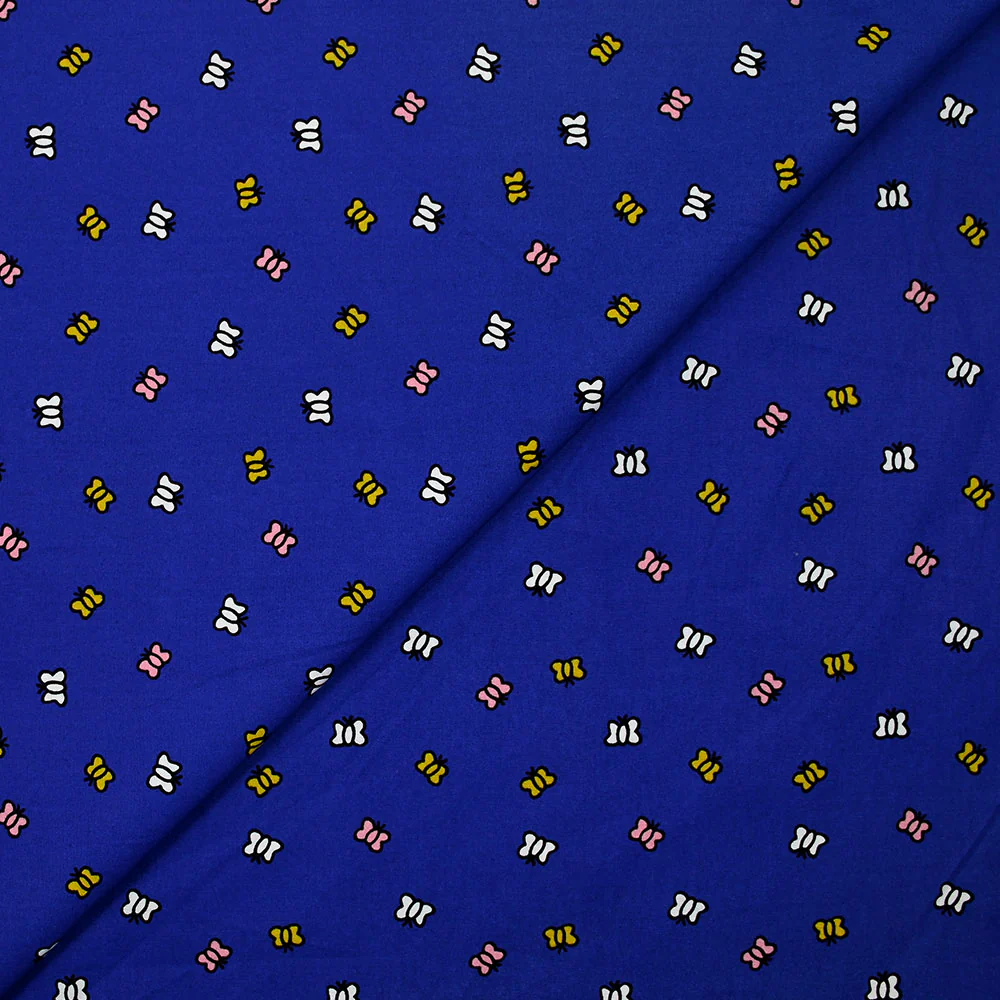 Coton imprimé envol de papillons fond bleu électrique