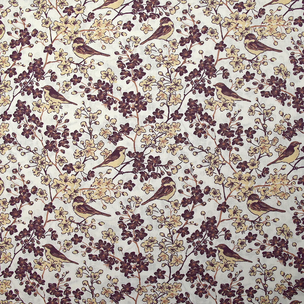 Coton imprimé envolée florale fond blanc cassé