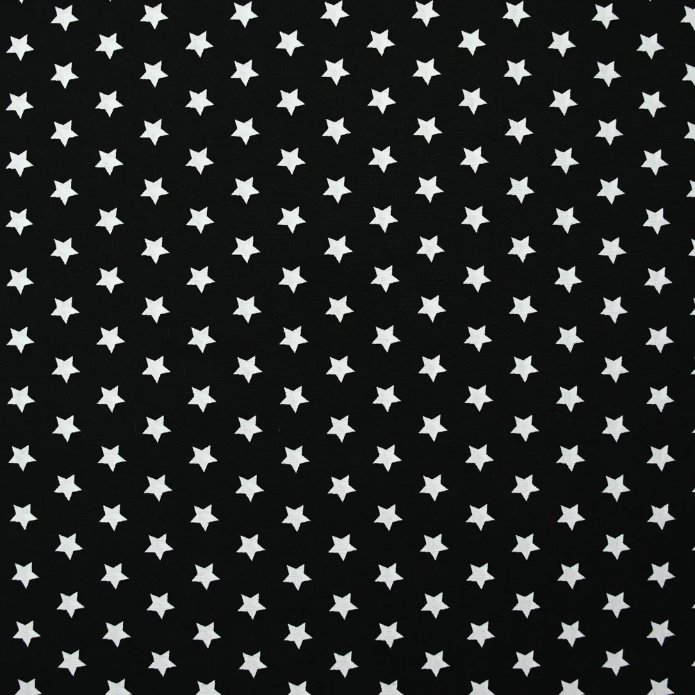 Coton imprimé étoile 1cm noir