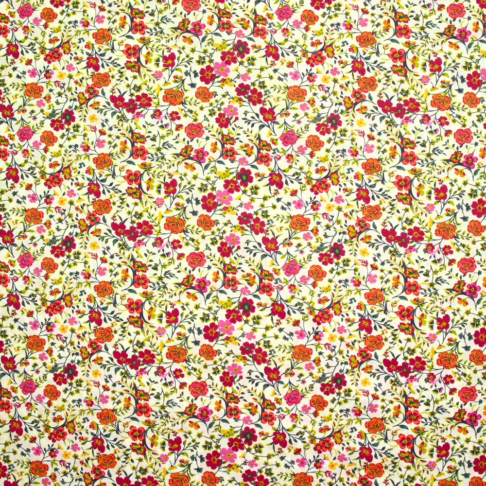 Coton imprimé Greta fleurs fuchsia et orange fond blanc au mètre