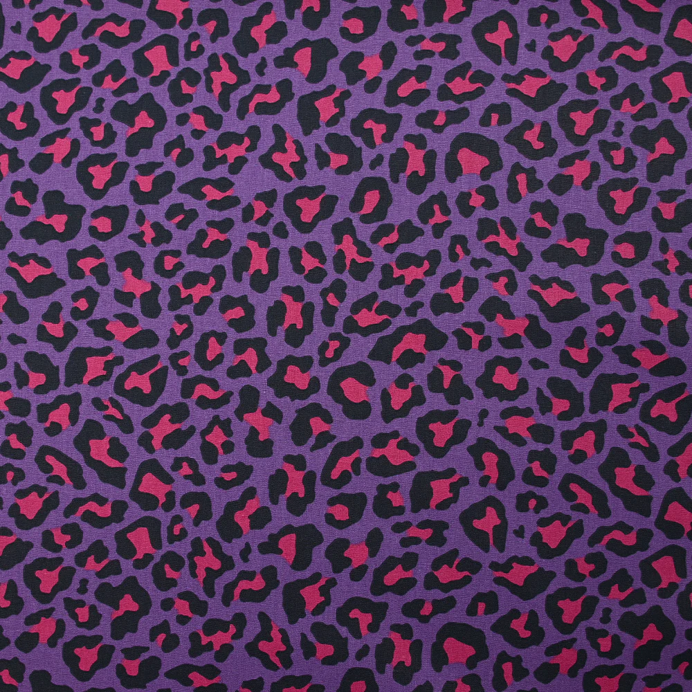 Coton imprimé léopard fuchsia fond violet