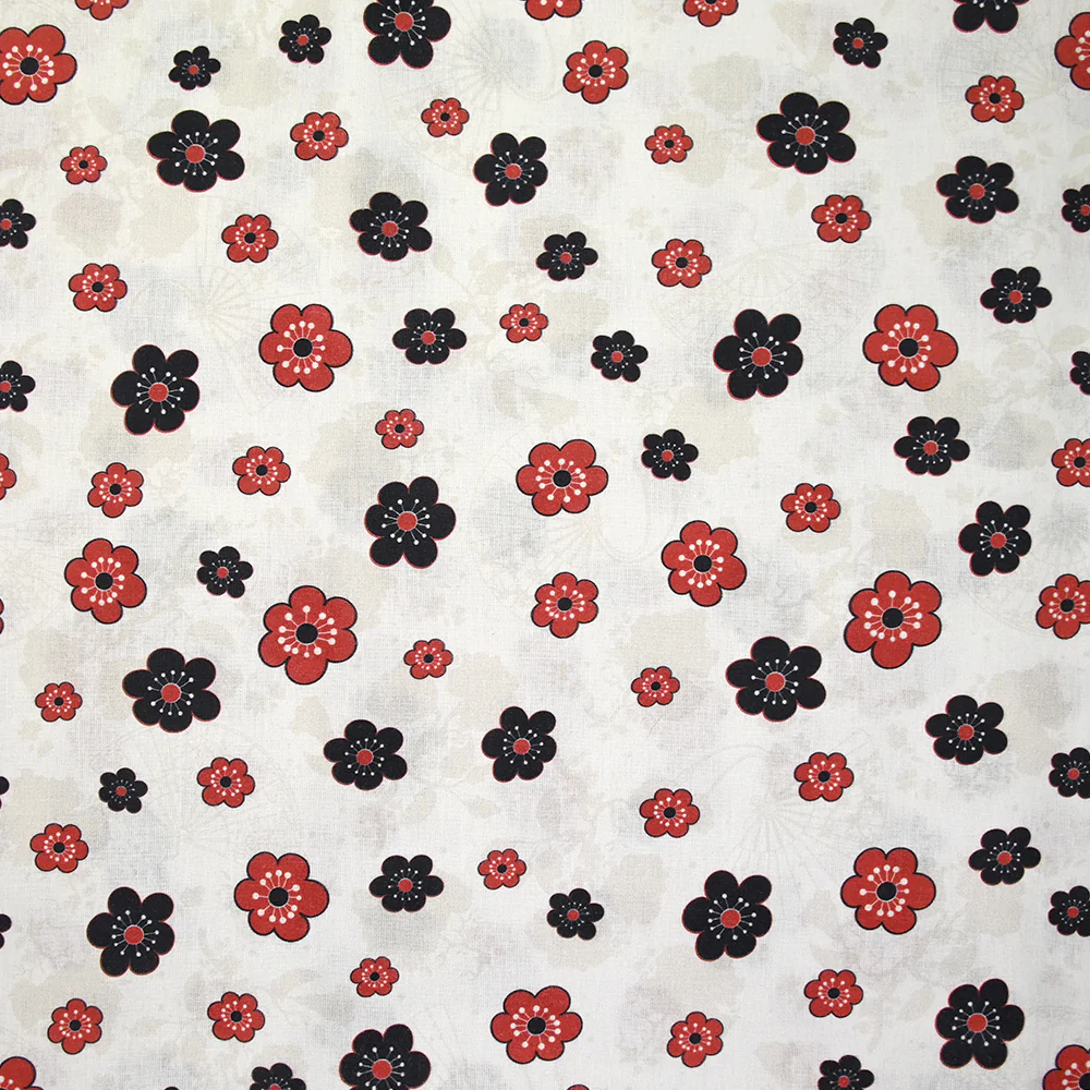 Coton imprimé marguerite noir et rouge fond blanc
