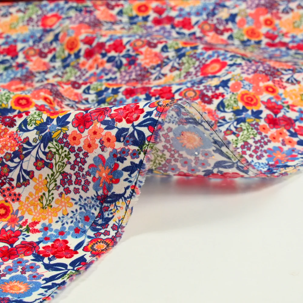 Coton imprimé Matilde fleurs orange et bleu au mètre - Image 6
