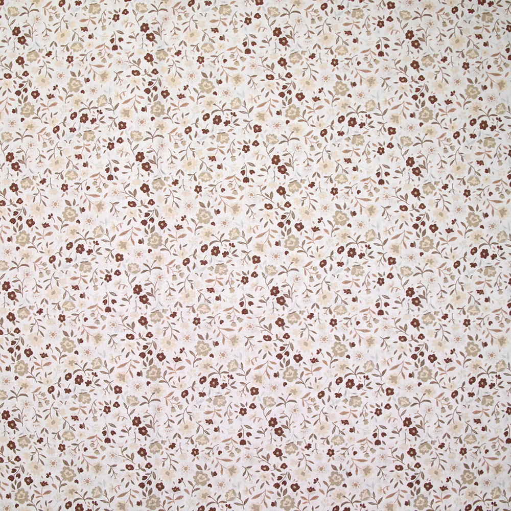 Coton imprimé ouragan floral marron fond blanc
