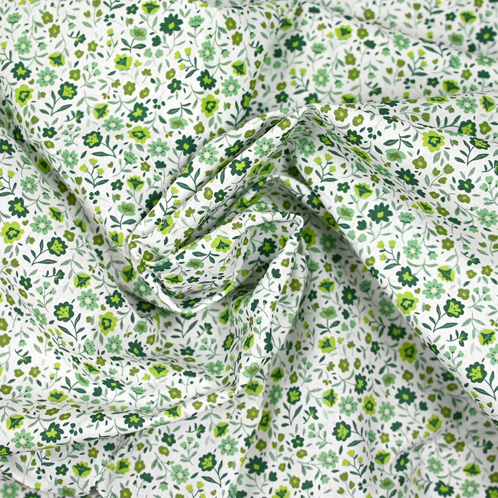 Coton imprimé ouragan floral vert fond blanc - Image 2