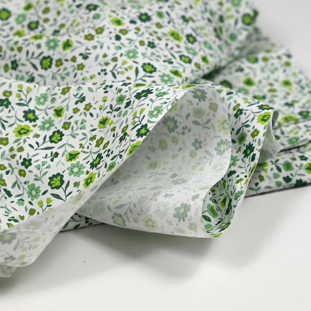 Coton imprimé ouragan floral vert fond blanc - Image 5