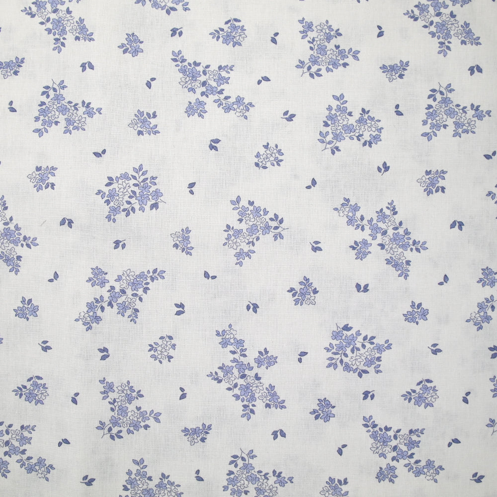 Coton imprimé petite brousse bleu fond blanc