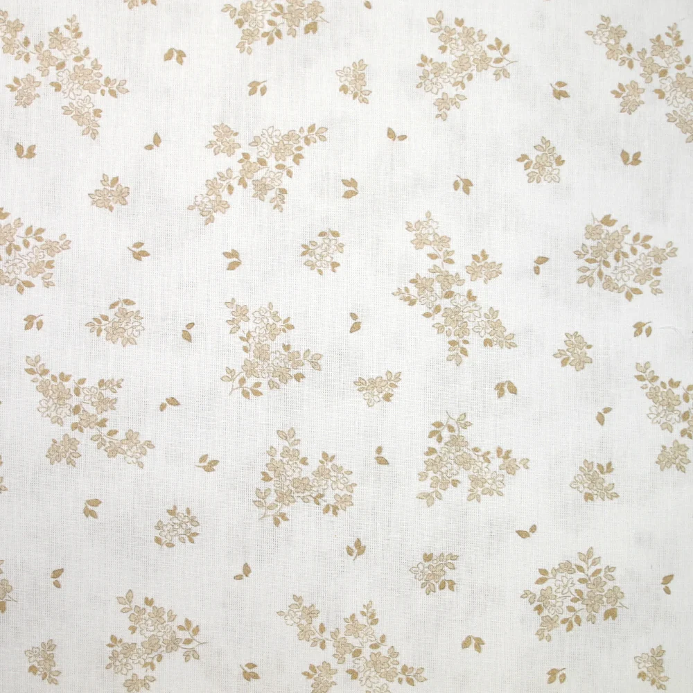 Coton imprimé petite brousse marron clair fond blanc