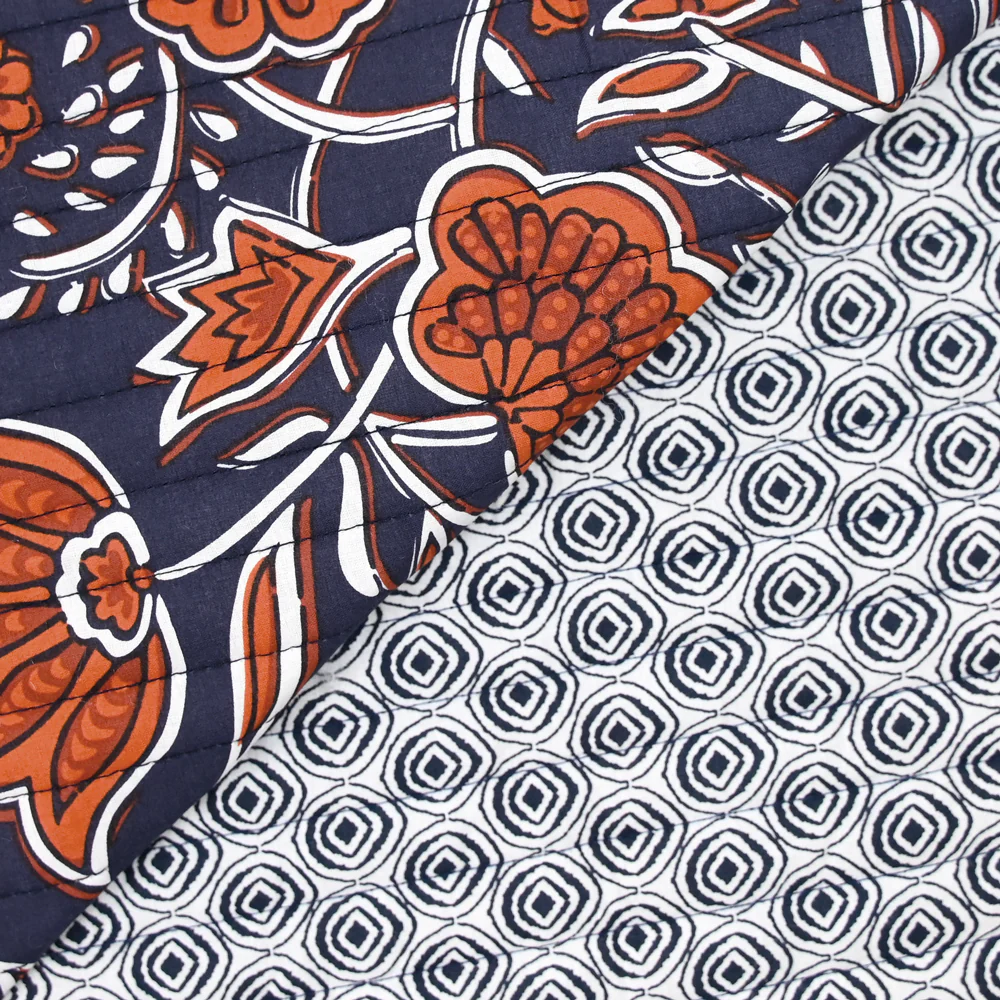 Coton matelassé double face empreinte marine et marron au mètre