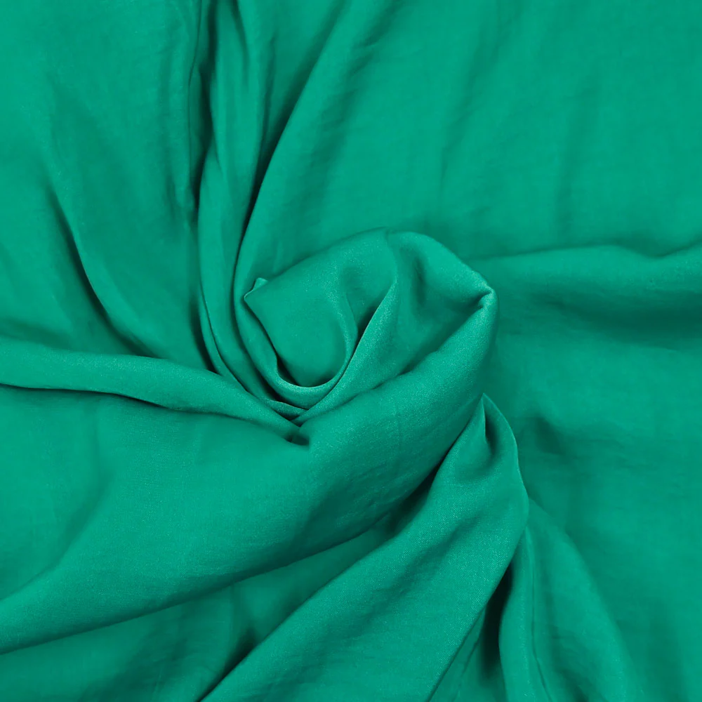 Crêpe satiné de polyester vert - Image 2