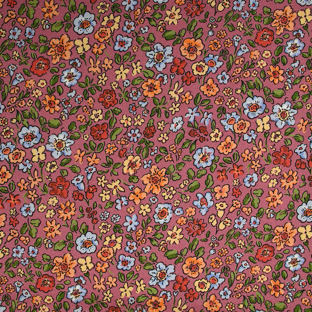 Crêpe viscose imprimé envolée florale fond cassis glacé