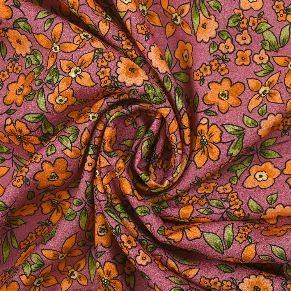 Crêpe viscose imprimé fleurs orange fond cassis glacé - Image 2