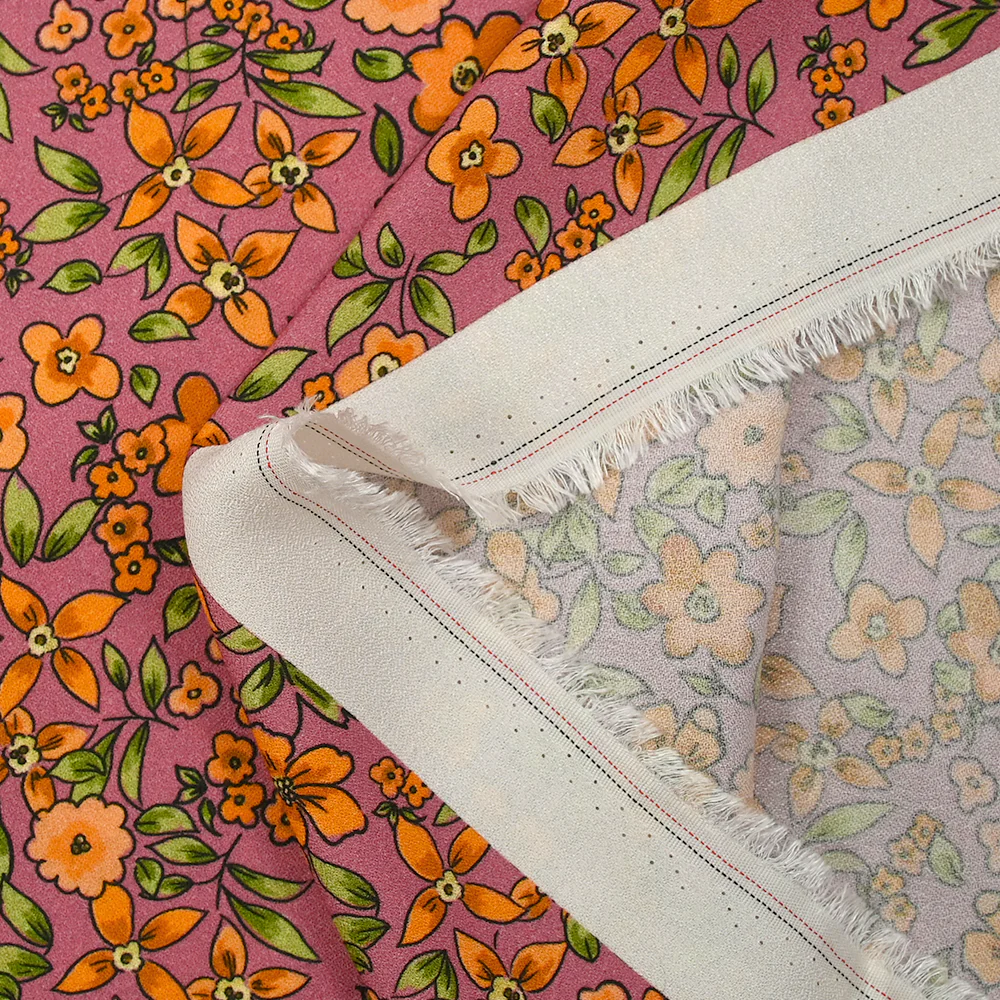 Crêpe viscose imprimé fleurs orange fond cassis glacé - Image 5