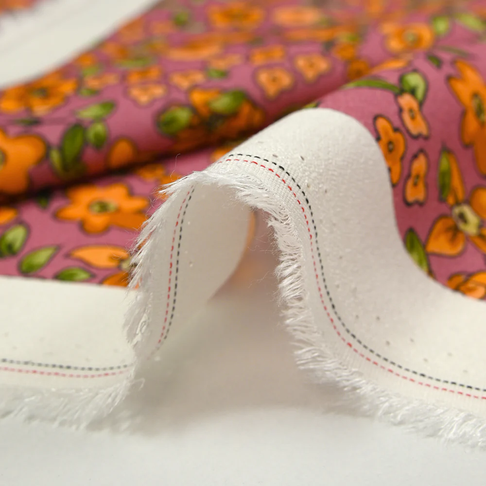 Crêpe viscose imprimé fleurs orange fond cassis glacé - Image 6