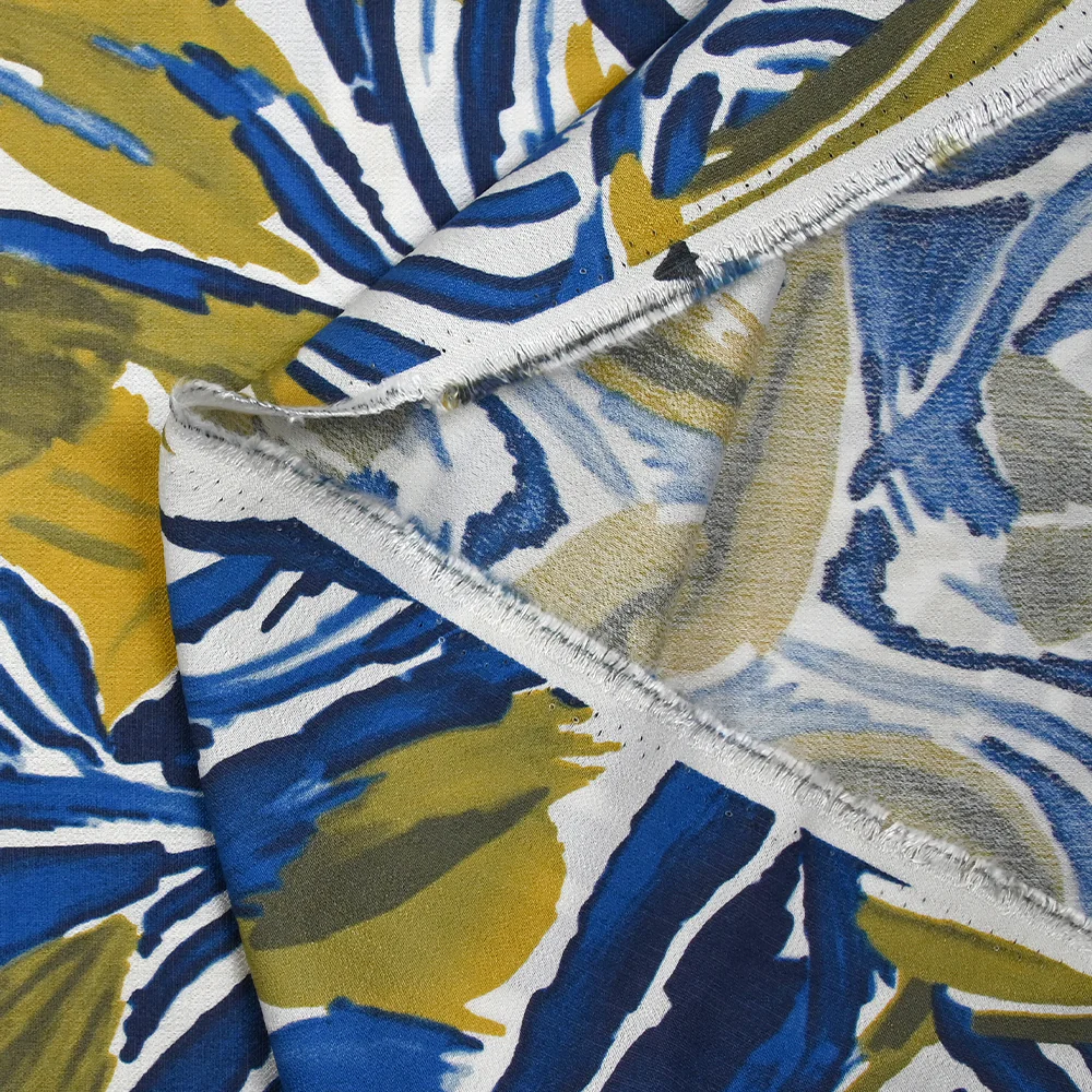 Crêpe viscose imprimé jungle anis et bleu fond blanc - Image 4