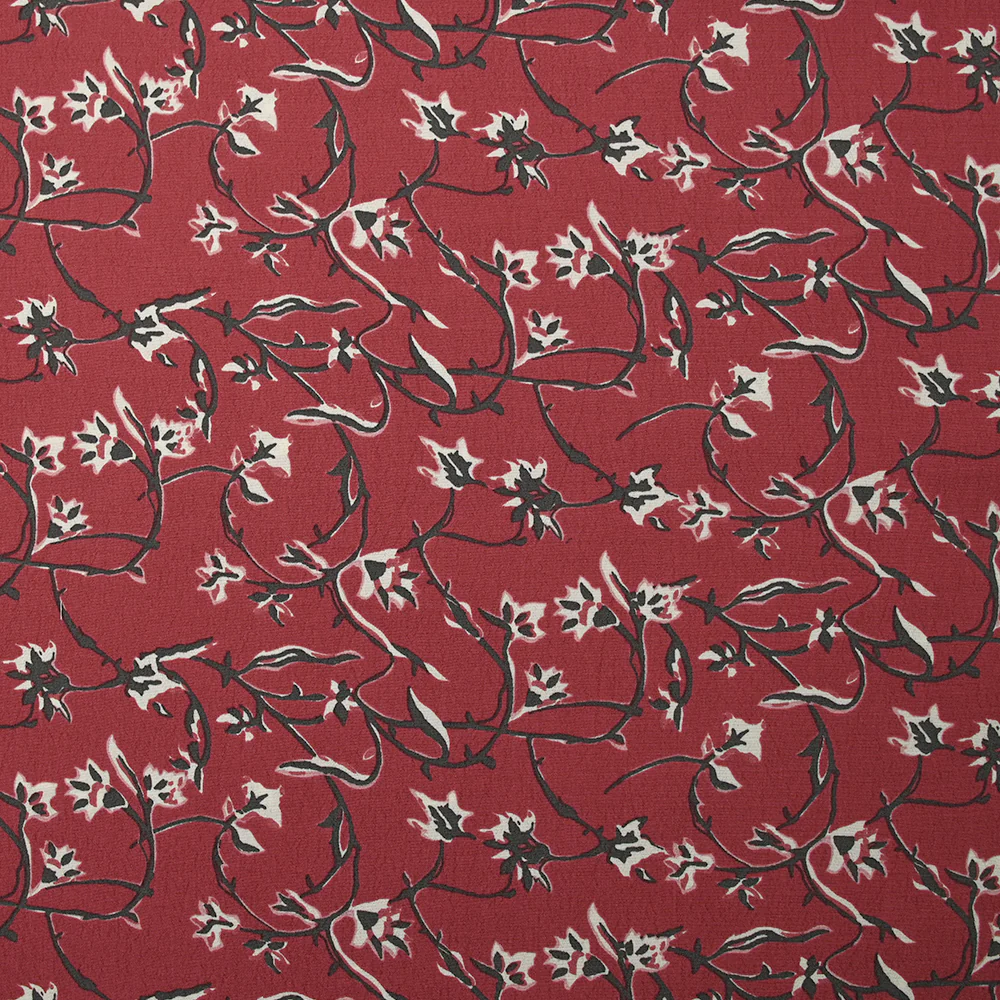 Crêpe viscose imprimé lien floral fond bordeaux
