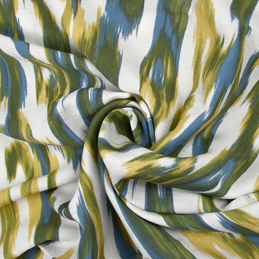 Crêpe viscose imprimé ondes abstraites vert et bleu fond blanc - Image 2