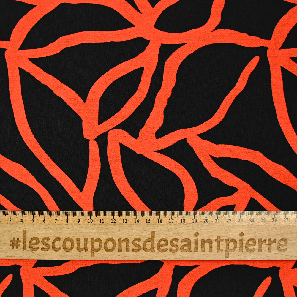 Crêpe viscose ottoman imprimé spaghetti orange fond noir - Image 4
