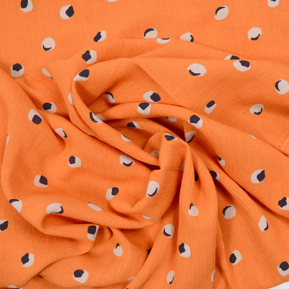 Crépon de viscose imprimé sphéricité fond orange - Image 2