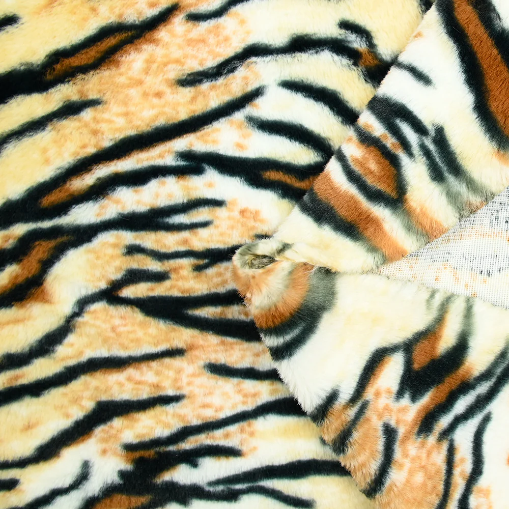 Fausse fourrure tigre fond blond - Image 4
