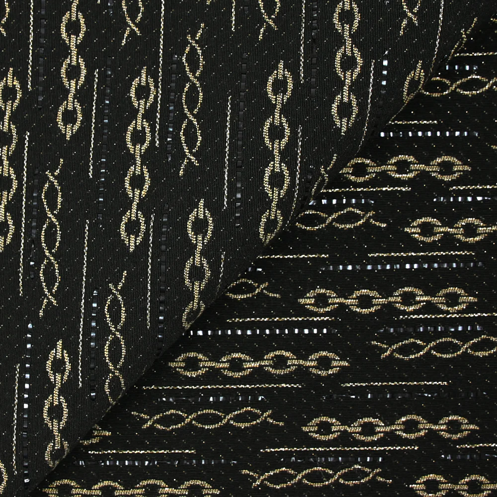 Jacquard de polycoton chaine doré fond noir