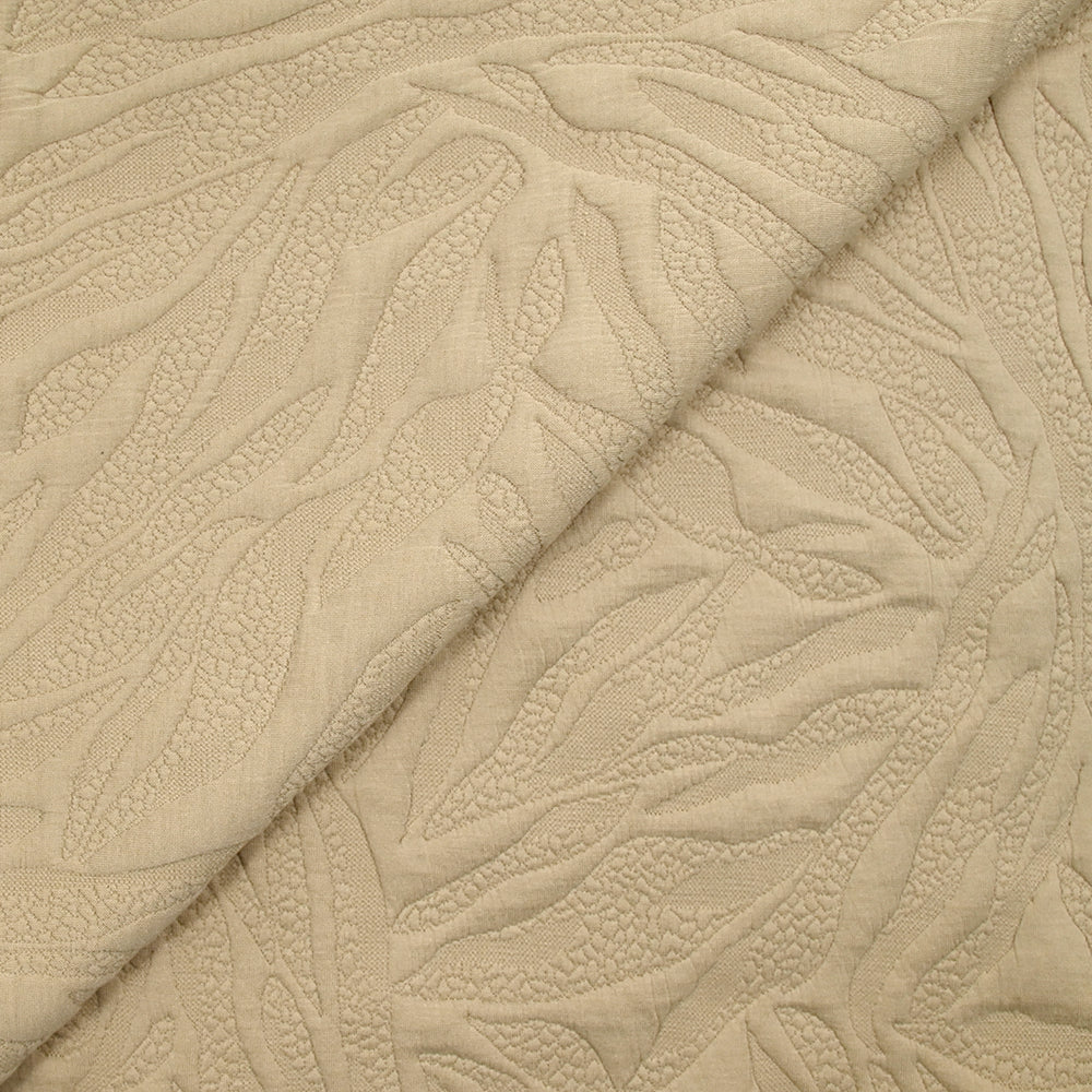 Jersey matelassé fissures fond beige