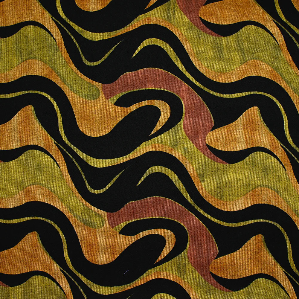 Maille Milano polyviscose mille vagues ocre et vert fond noir
