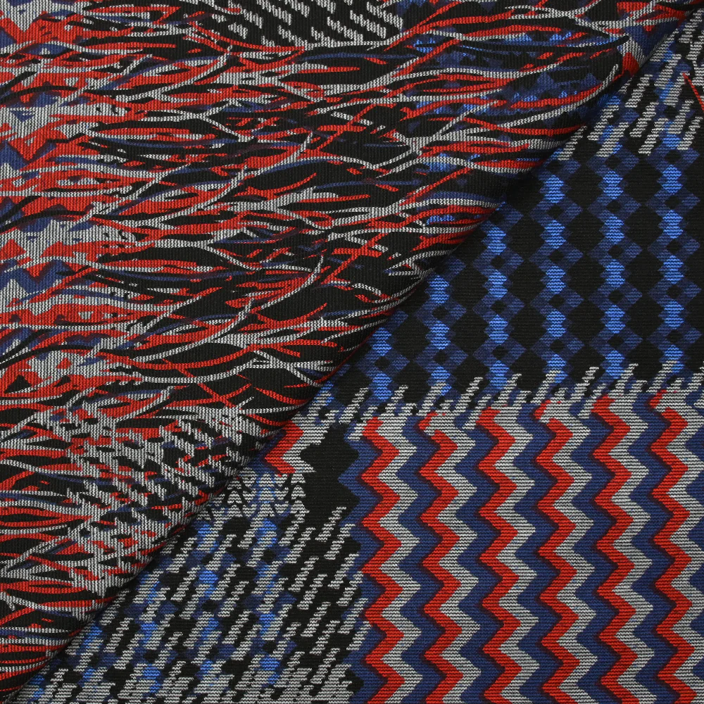 Maille Milano polyviscose mosaïque d'antan bleu et rouge fond noir