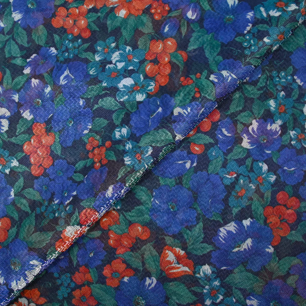 Maille polyester lamée fleurs bleu et rouge fond marine