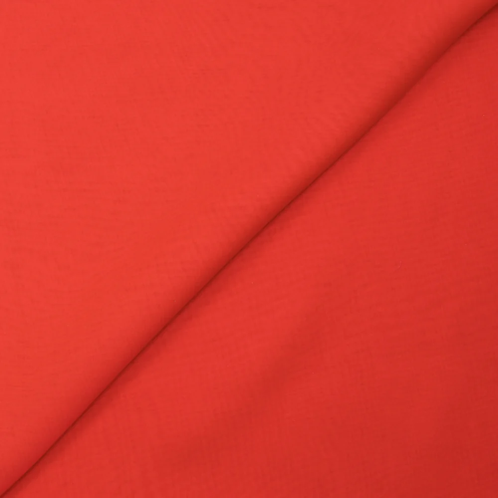 Mousseline de 100% soie unie rouge corail