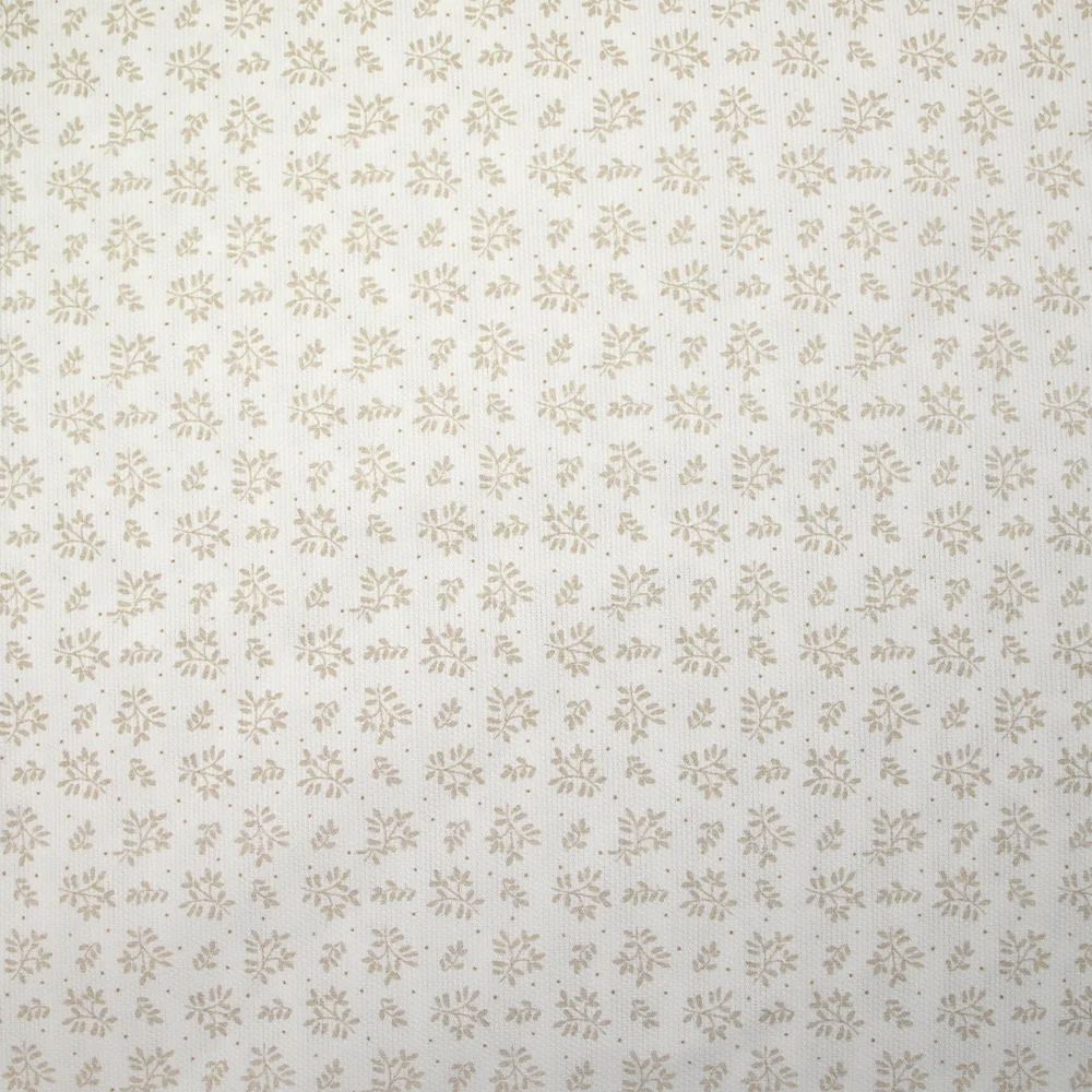 Piqué de coton imprimé brindille dans le vent beige fond blanc