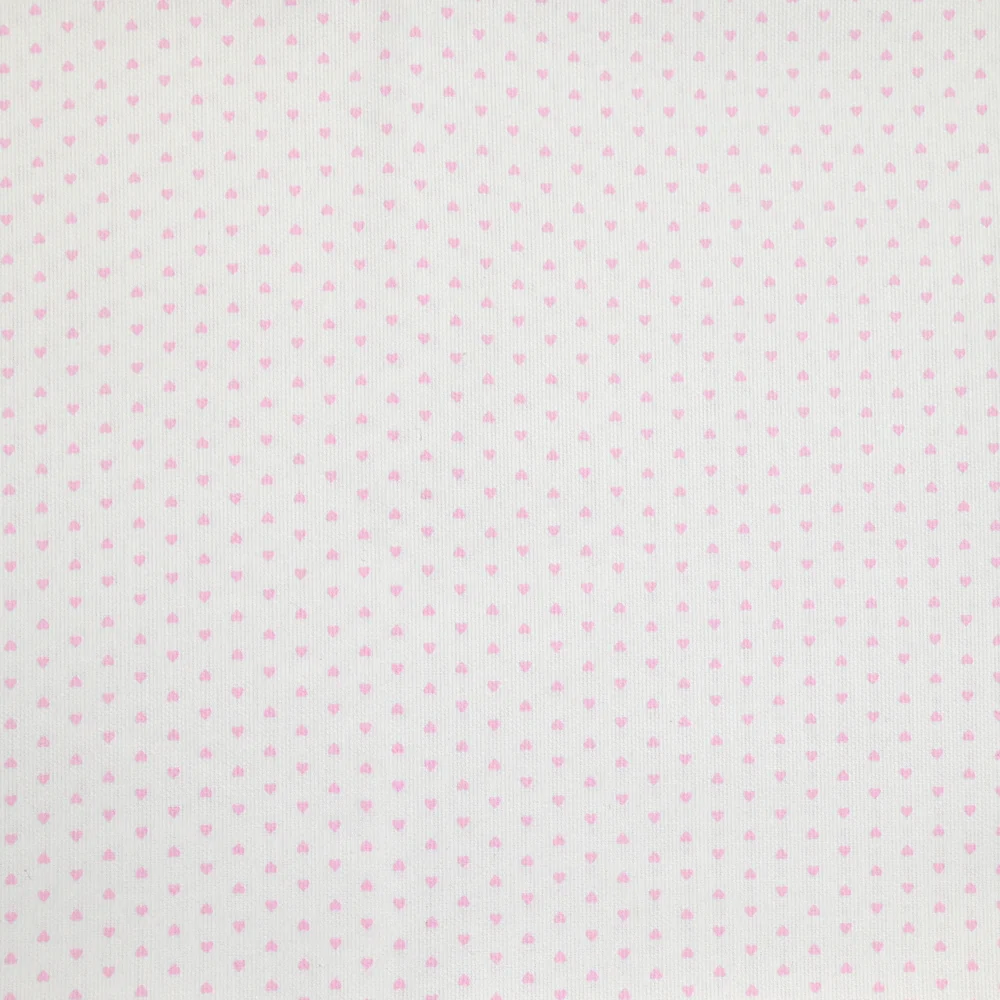 Piqué de coton imprimé coeur rose fond blanc