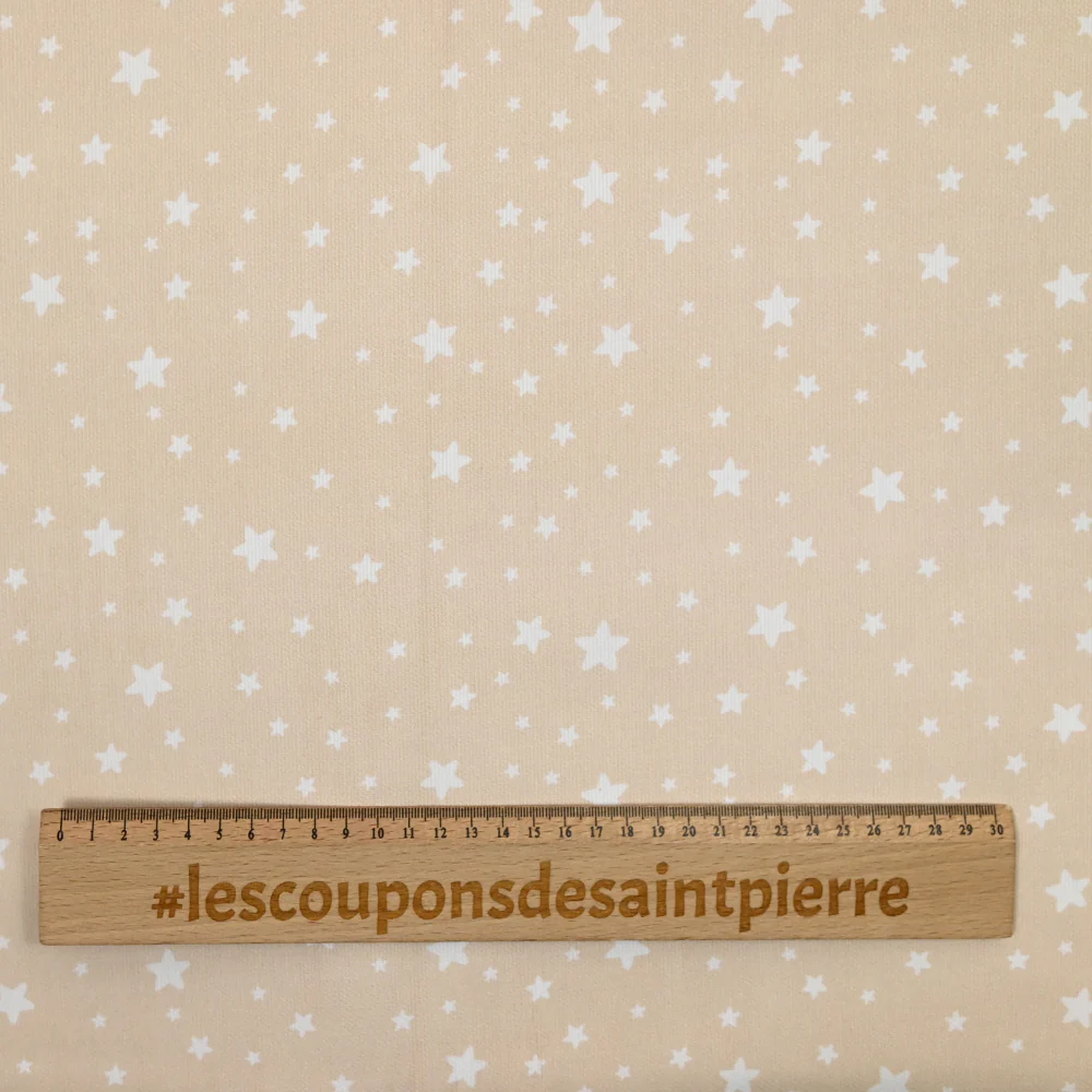 Piqué de coton imprimé étoiles fond beige - Image 4