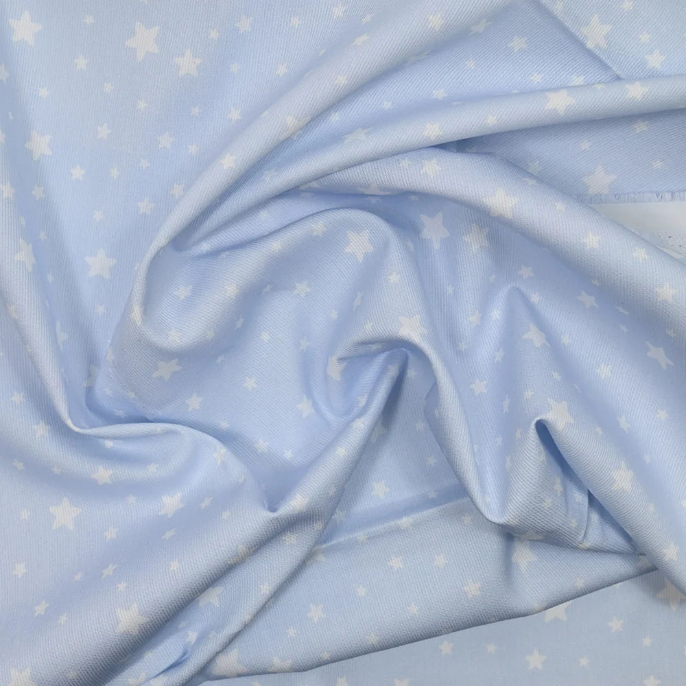 Piqué de coton imprimé étoiles fond bleu clair - Image 2