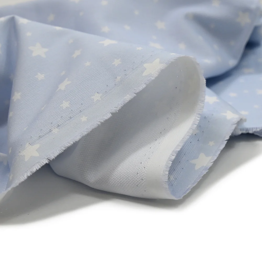 Piqué de coton imprimé étoiles fond bleu clair - Image 5
