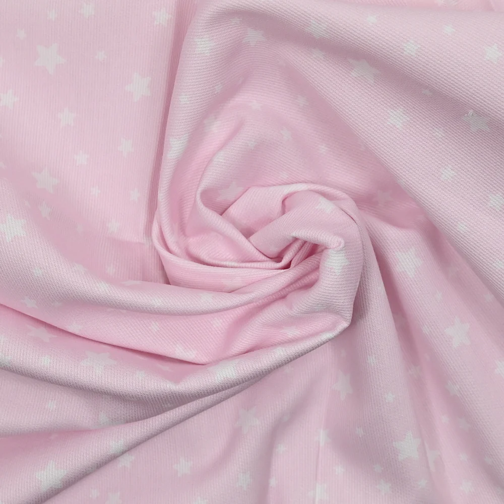 Piqué de coton imprimé étoiles fond rose clair - Image 2