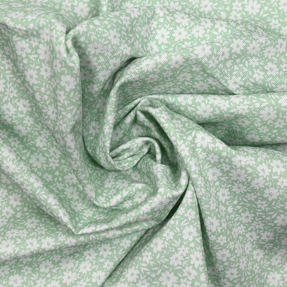 Piqué de coton imprimé fleurs printanière fond vert - Image 2