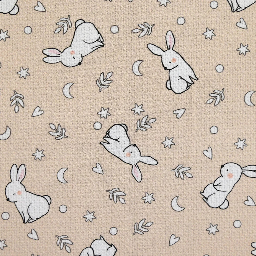 Piqué de coton imprimé jeune lapin fond beige - Image 4
