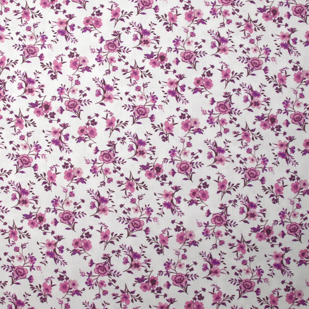 Piqué de coton imprimé les fleurs de Louna violet fond blanc
