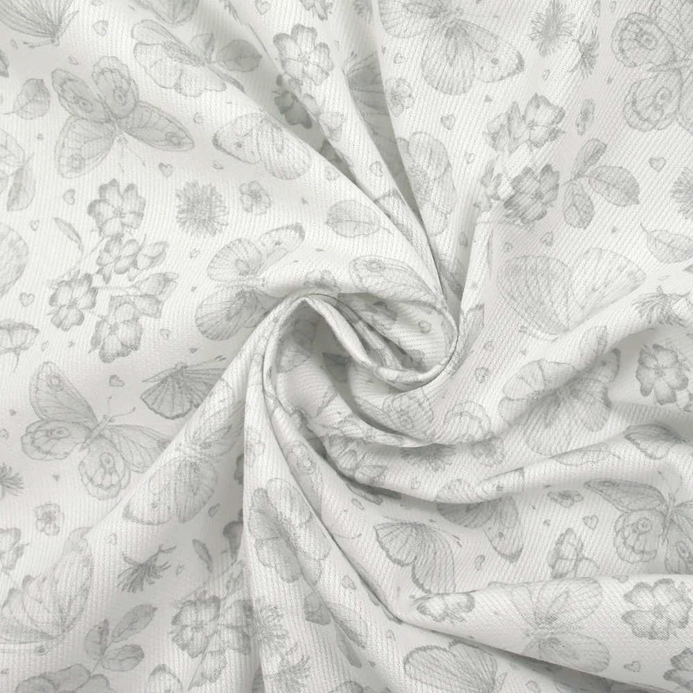 Piqué de coton imprimé papillons et fleurs fond blanc - Image 2