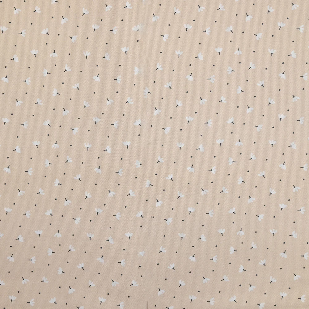 Piqué de coton imprimé pissenlit fond beige
