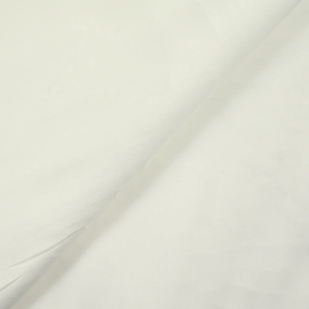Piqué de polyester élasthanne blanc