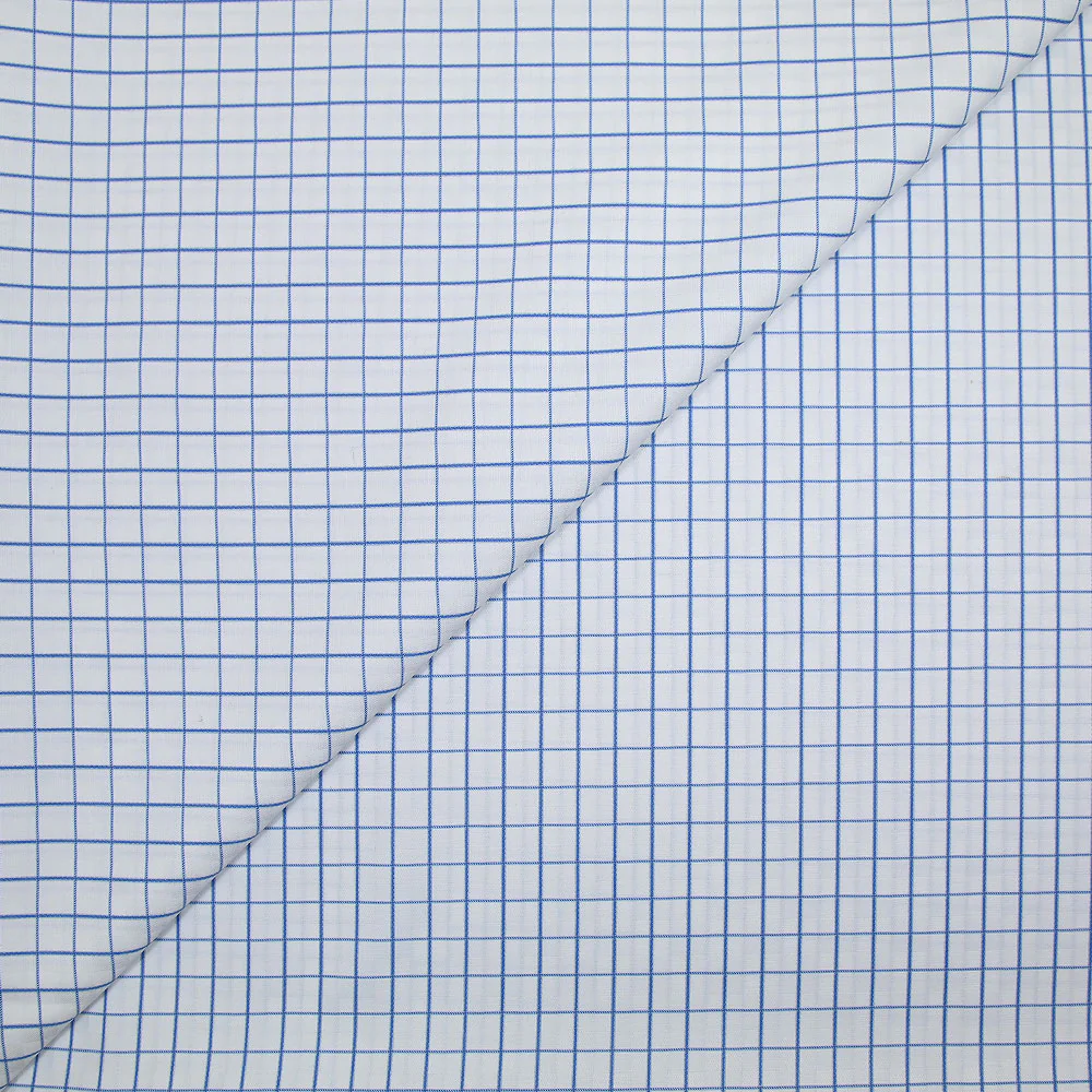 Popeline polycoton jacquard à carreaux bleu denim fond blanc