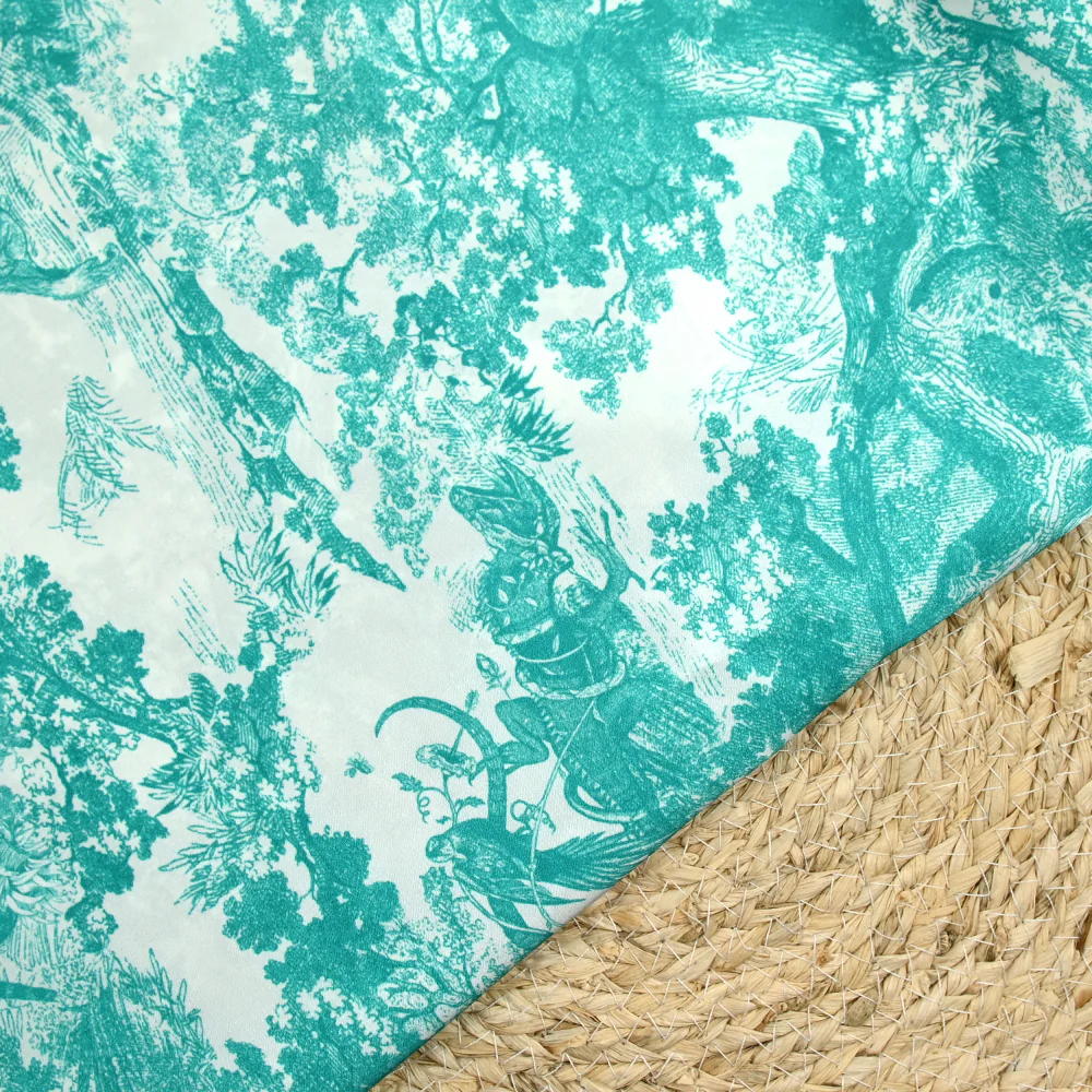 Satin de soie imprimé dans la jungle turquoise fond blanc