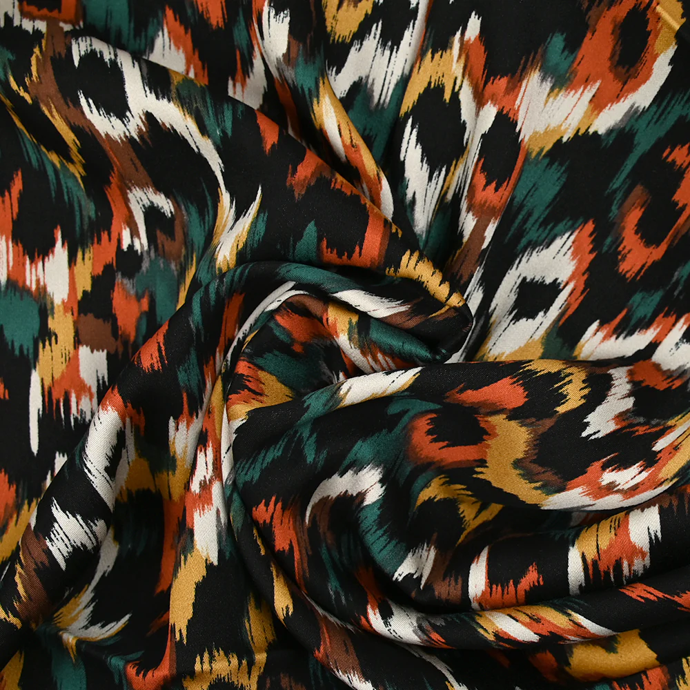 Satin de viscose imprimé Vénus orange brûlé fond noir - Image 2