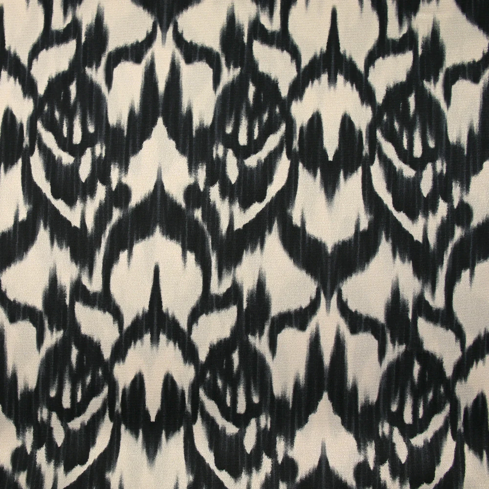 Satin polyester imprimé ikat noir fond écru