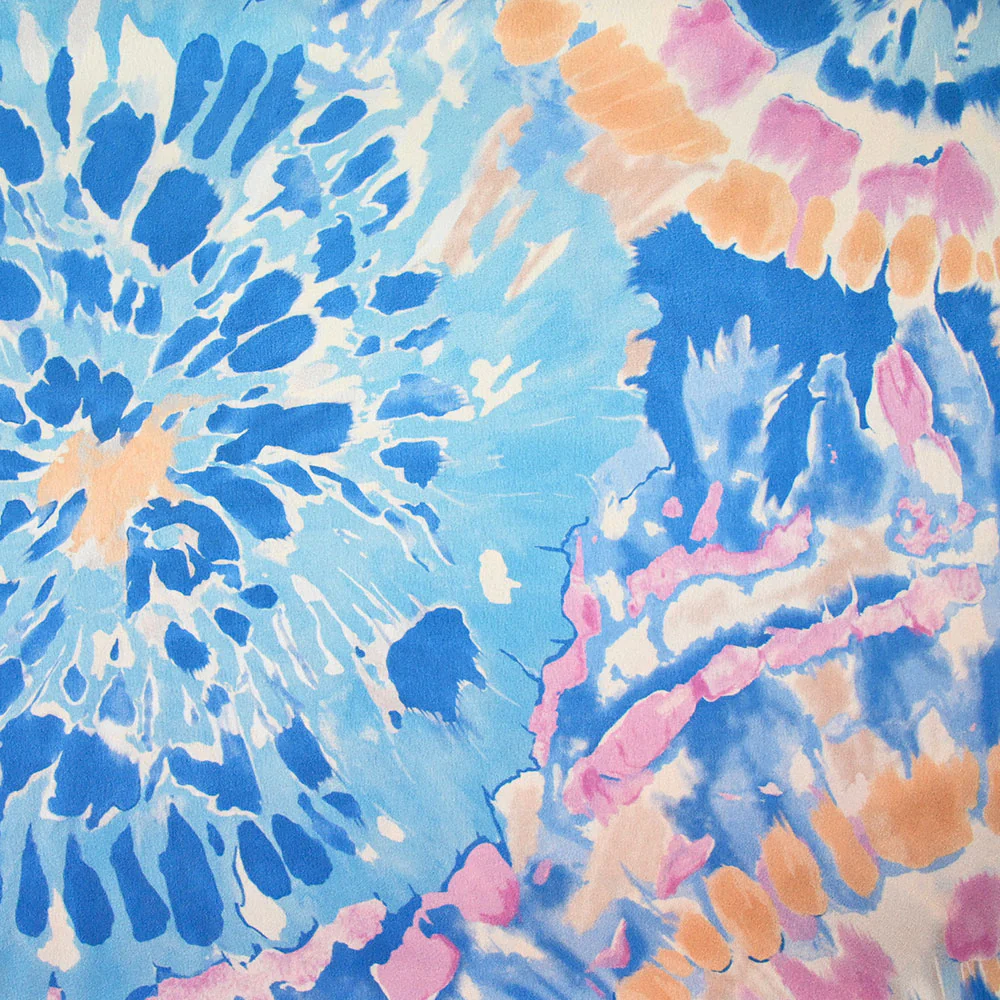 Satin polyester imprimé tie dye pastel beige et bleu