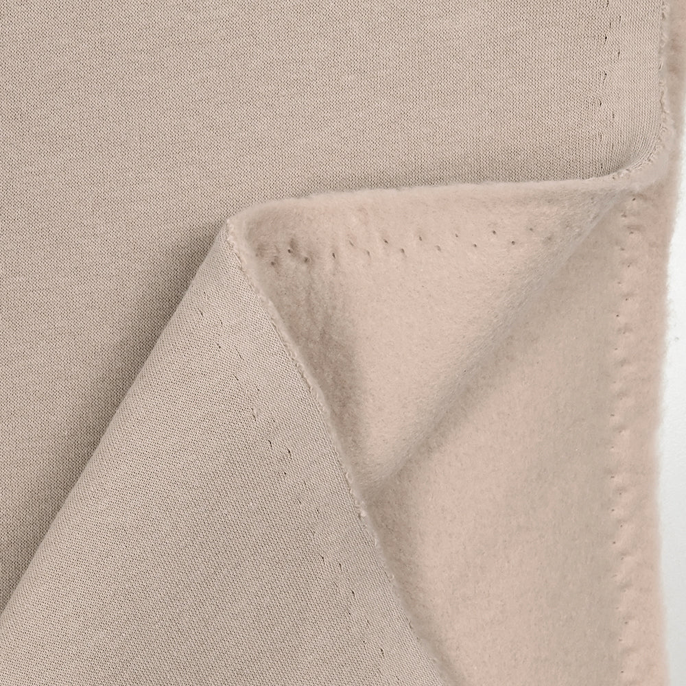 Tissu sweat minkee épais beige rosé - Image 5